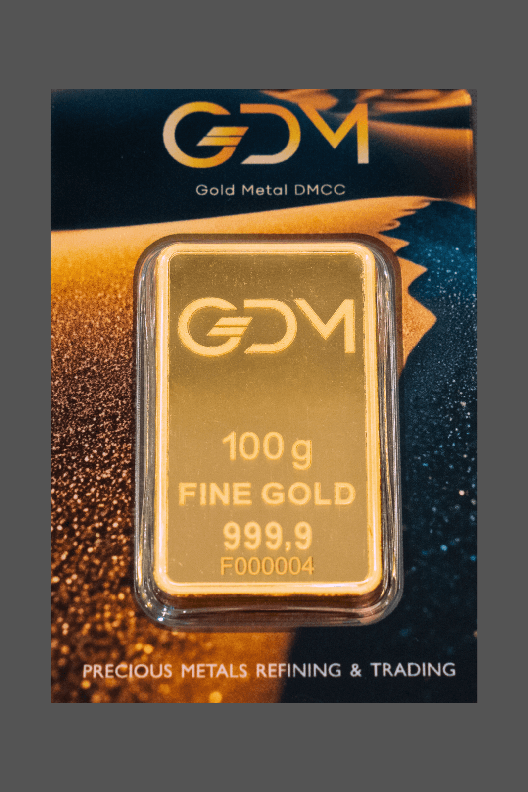 Gold Metal DMCC 100 g gold blister bar — manufacturer product photograph